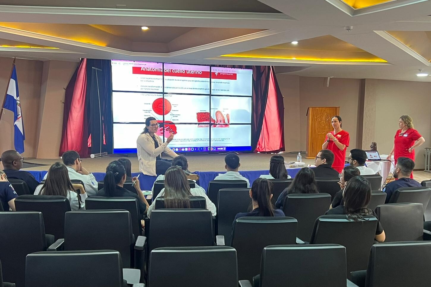 medical mission trip professionals in an auditorium to learn cervical cancer protocols during a Clinics trip to Paraguay