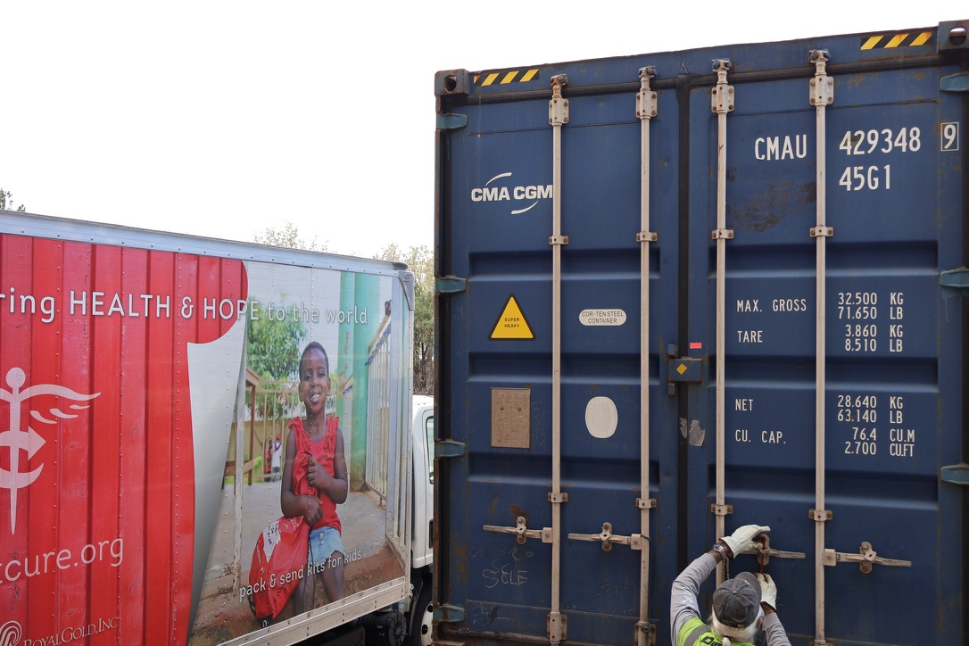 Closed C.U.R.E. Cargo container packed with life-saving medical supplies, ready for global delivery from the Project C.U.R.E. distribution center.