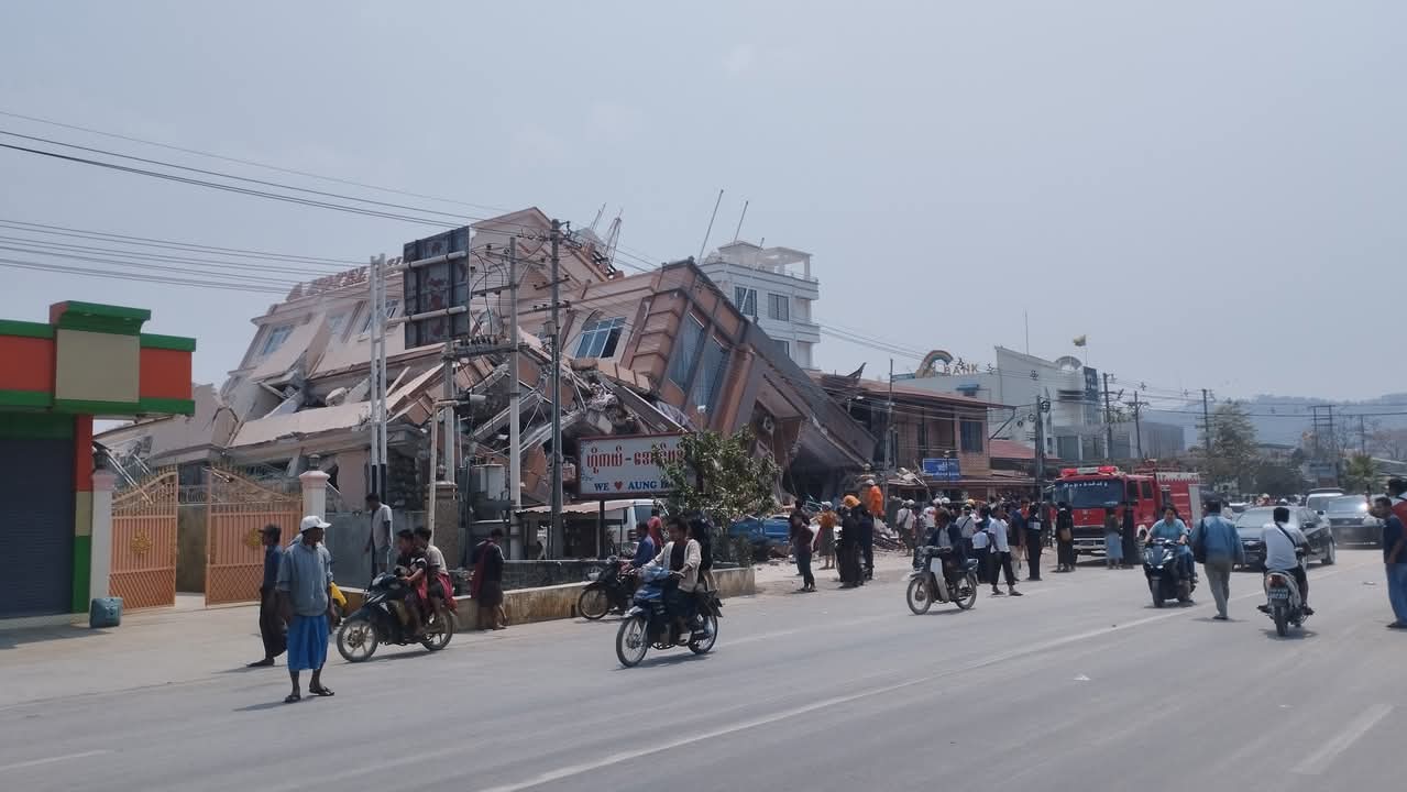 Collapsed infrastructure in Myanmar following the 2025 earthquake, showing extensive damage and the urgent need for relief aid.