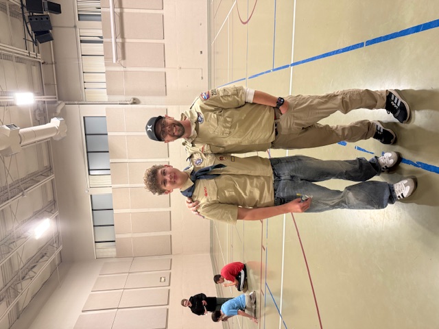 Eagle Scout Tyler and his father, Jeff, at Kits for Kids Packing Event with Project C.U.R.E.