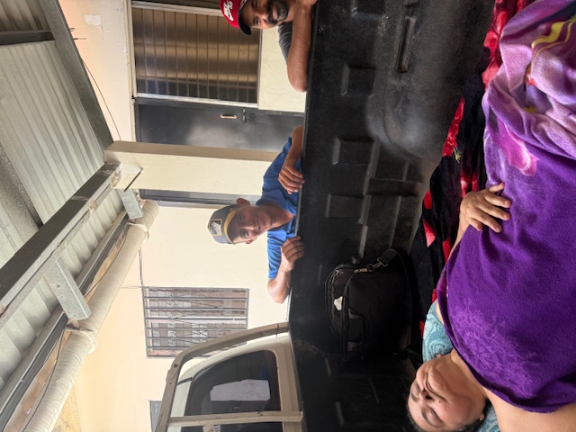 Patient in the back of a truck coming to Project C.U.R.E. Clinic in Honduras