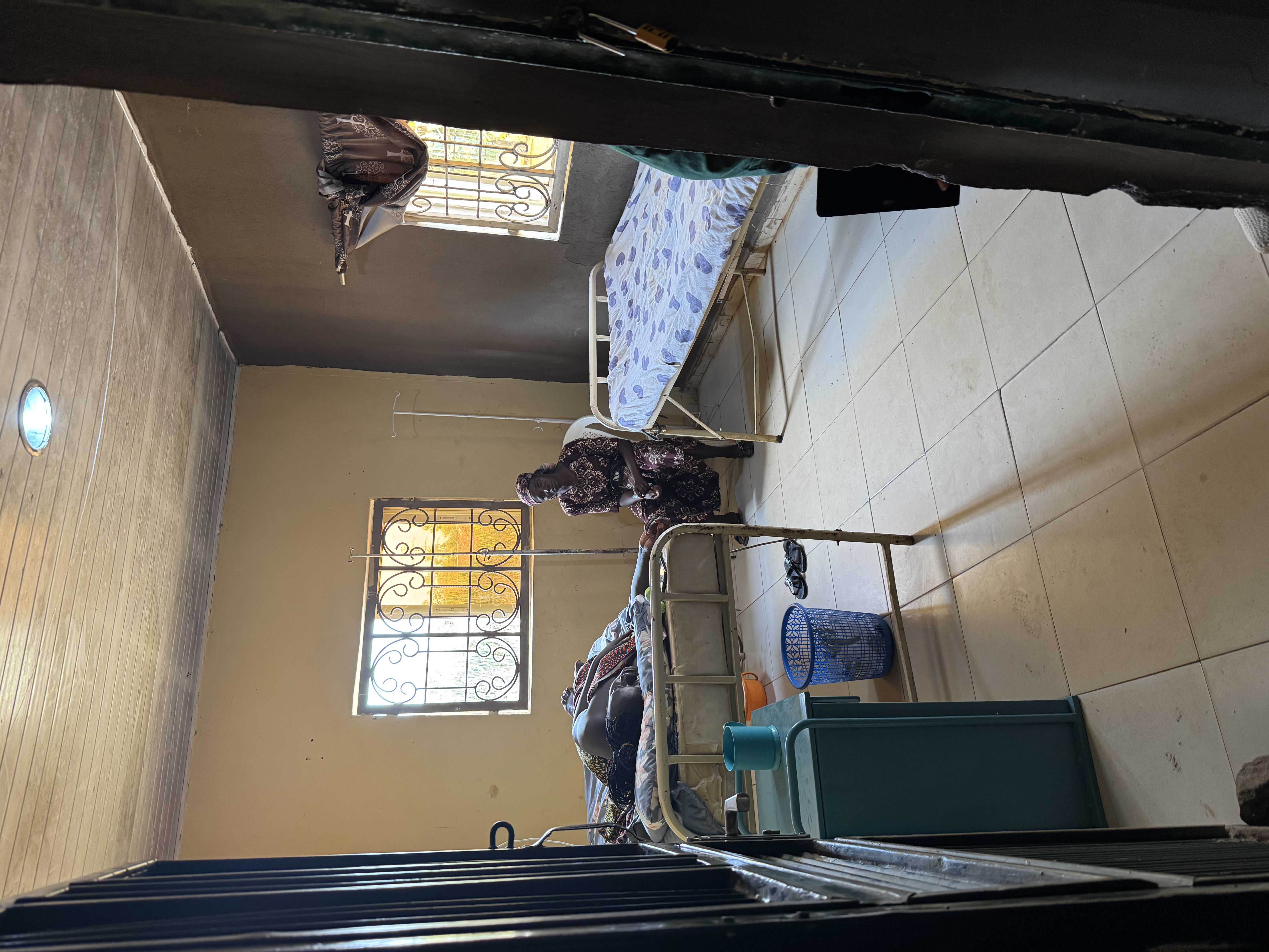 Patient receiving care inside Kwacki Gilead Medical Center, a rural hospital improving healthcare access in Nigeria.