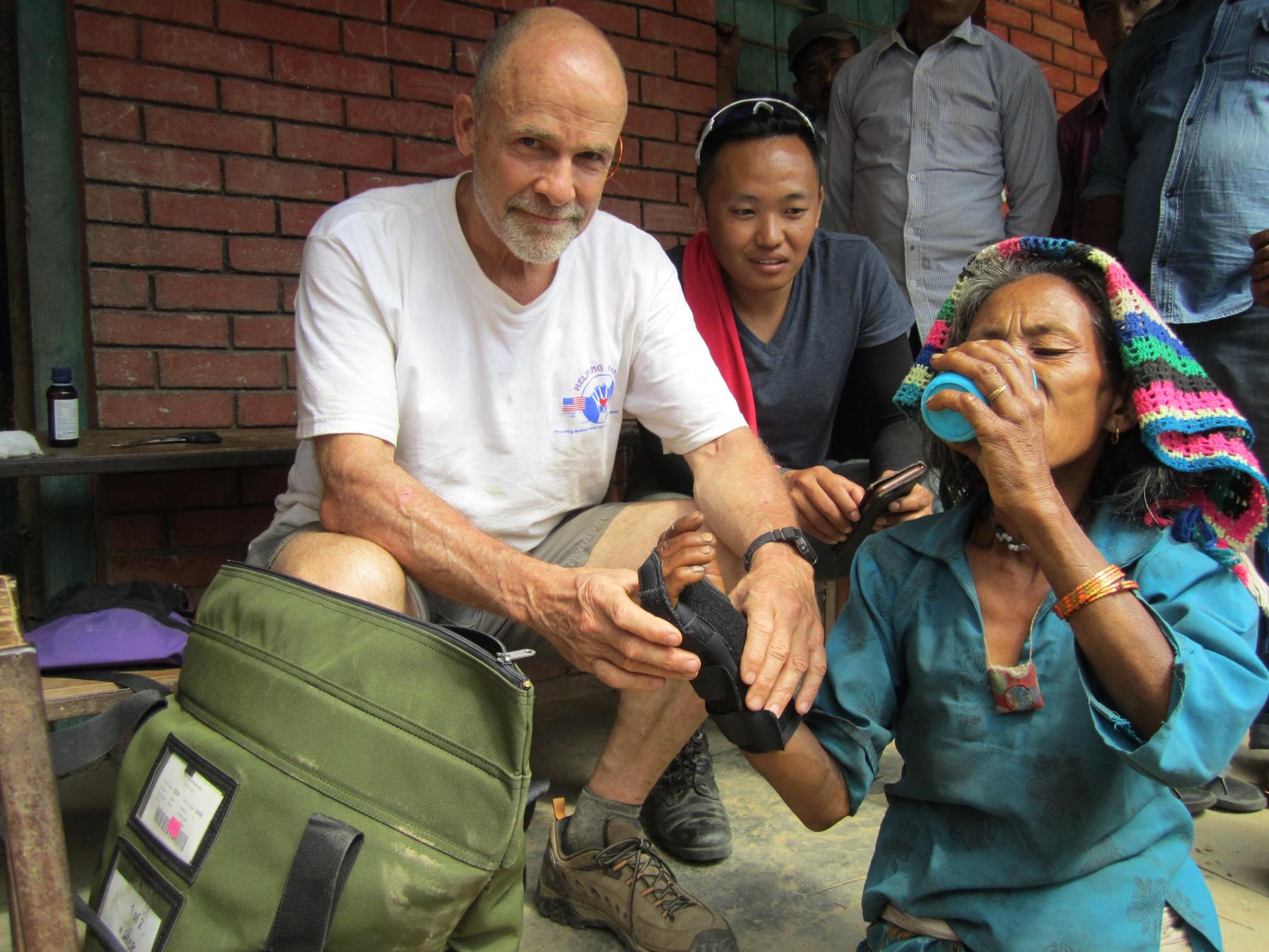 Project C.U.R.E. volunteer delivering C.U.R.E. Kits to Nepal.